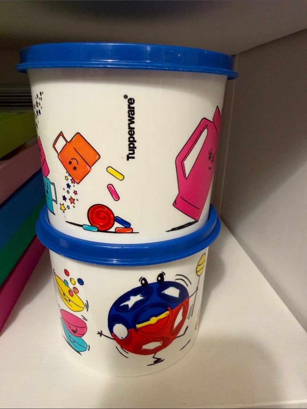 Tupperware White Snack Containers with Blue Lids and Colorful Cartoon Graphics